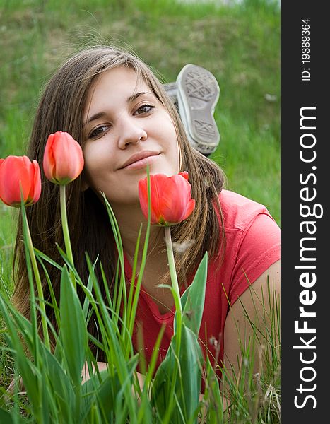 Young girl and tulips