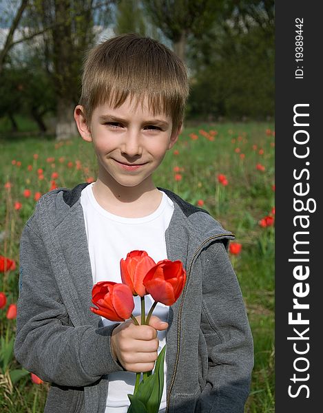 Boy With Bouquet Of Tulips