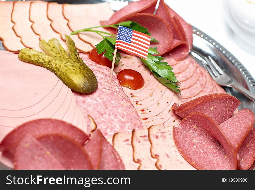 Plate of sausage with USA banner