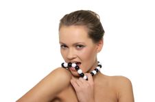 Beautiful Woman With Black And White Beads Royalty Free Stock Images