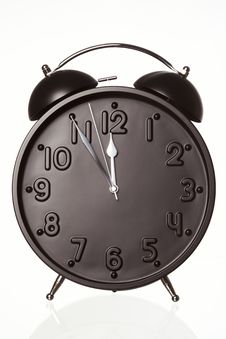 Alarm Clock Showing Five Minutes To Twelve. Royalty Free Stock Images Alarm Clock Showing Five Minutes To Twelve. Royalty Free Stock Images