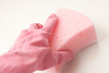 Hand In Rubber Glove Holding Sponge Royalty Free Stock Photography