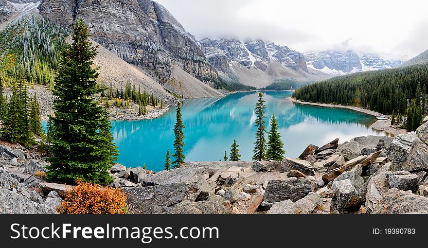 This photograph was taken in a national park in West-Canada. It's Morraine lake, one of the most photographed lakes in the world and is famous for it's blue-green color. This photograph was taken in a national park in West-Canada. It's Morraine lake, one of the most photographed lakes in the world and is famous for it's blue-green color