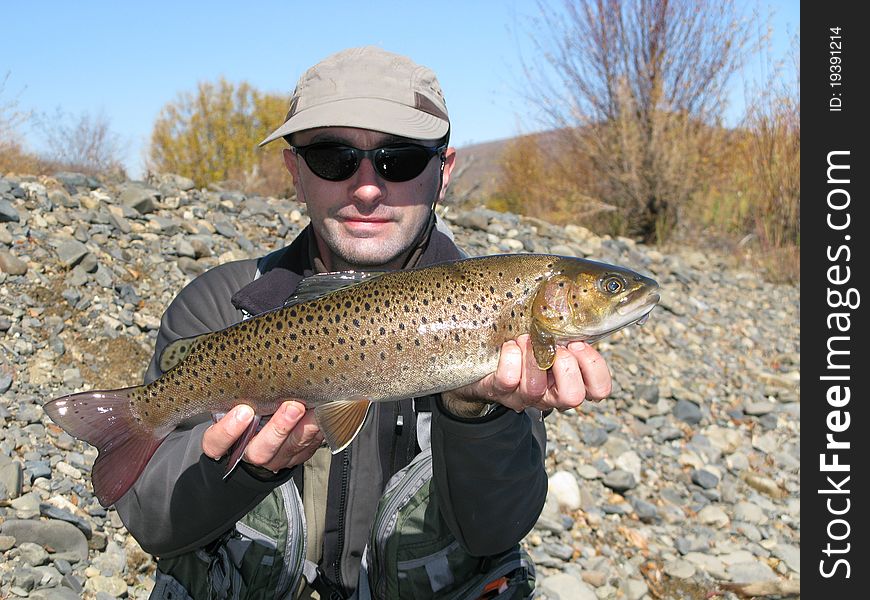 Fishing - fisherman catched big trout