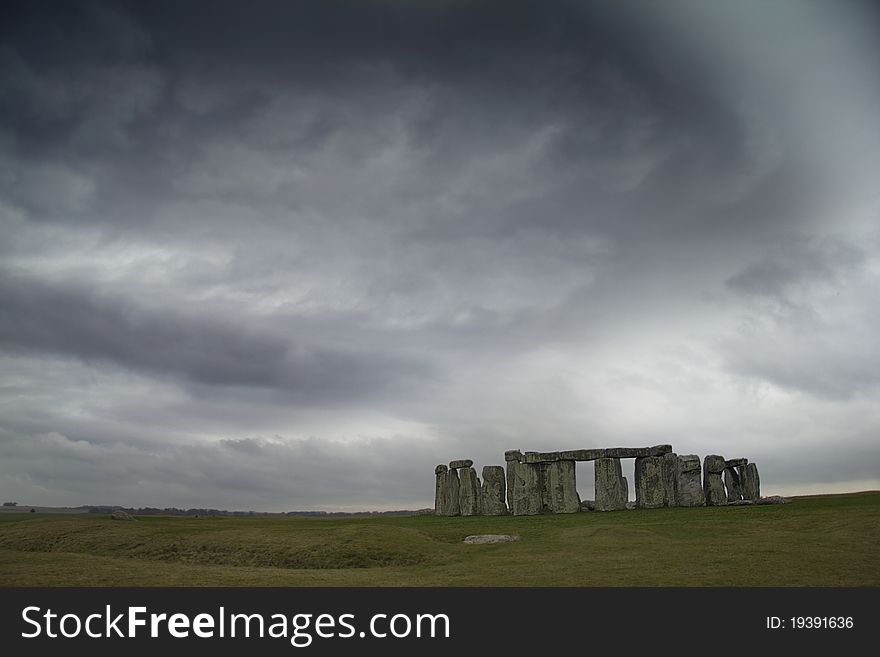 The famous stones in Wiltshire sunder a threatening skyline. The famous stones in Wiltshire sunder a threatening skyline
