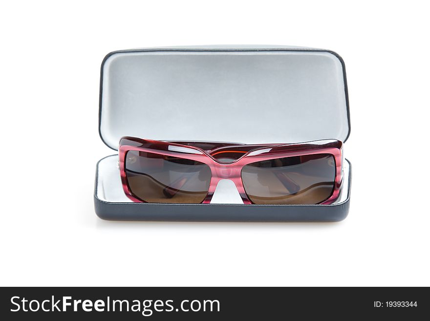 Women's sunglasses in red isolated on white background