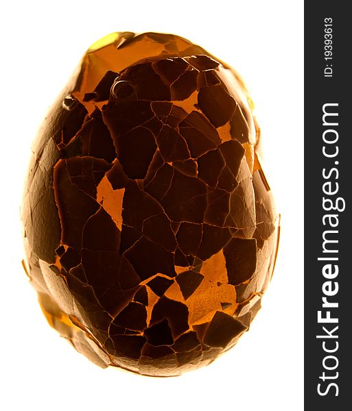 Hen's egg  with cracked shell on white background. Hen's egg  with cracked shell on white background