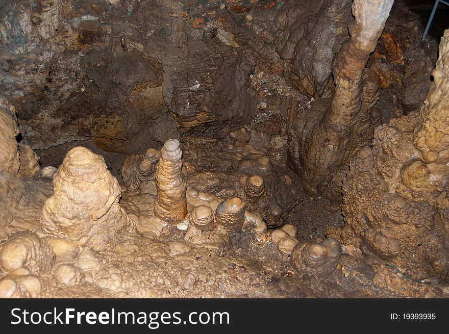 Stalactites and stalagmites in a cave. Stalactites and stalagmites in a cave