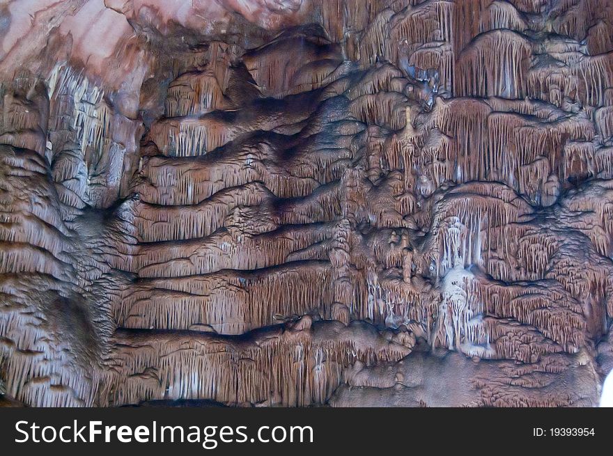 Stalactites and stalagmites in a cave. Stalactites and stalagmites in a cave