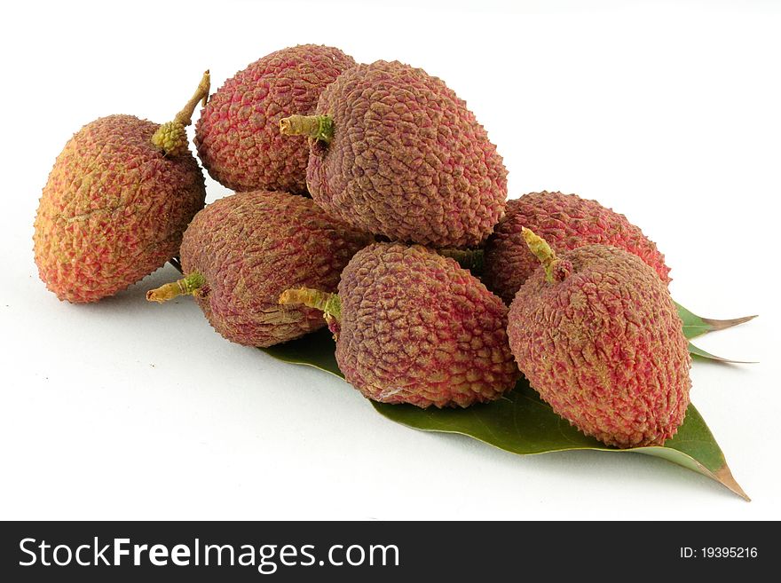Isolated Lychees on leaf in whitebackground