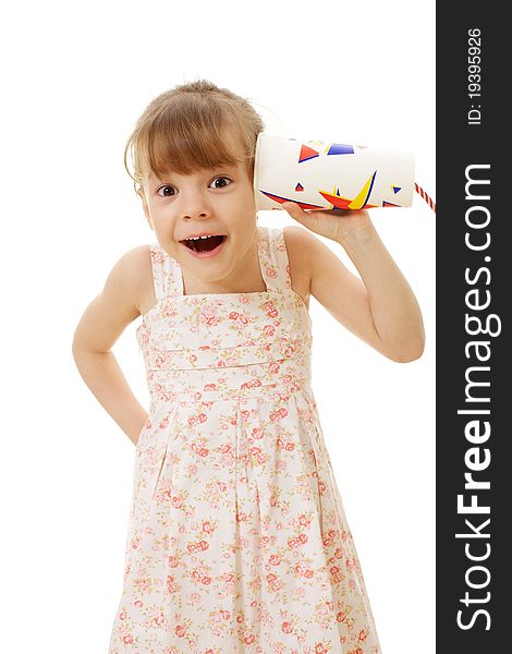 Surprised beautiful little girl in summer dress calling by telephone - paper glass with cable. Surprised beautiful little girl in summer dress calling by telephone - paper glass with cable