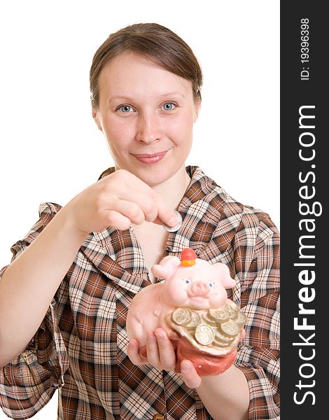 Woman with piggy bank on white background.