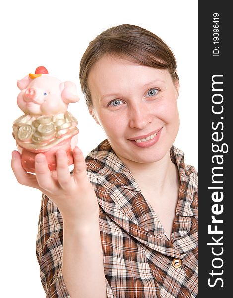 Woman with piggy bank on white background.