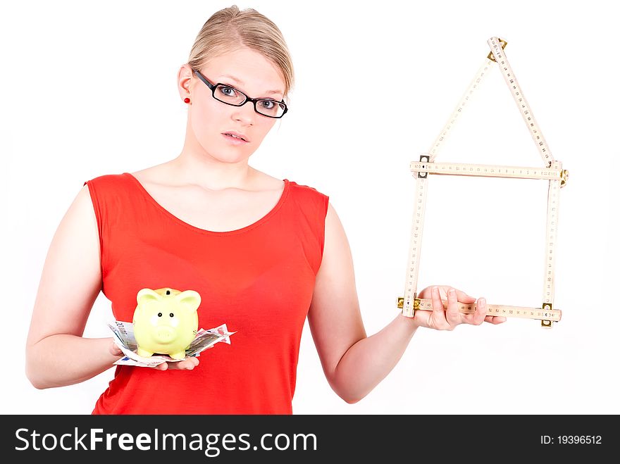 Young Woman With House Symbol And Piggy Bank