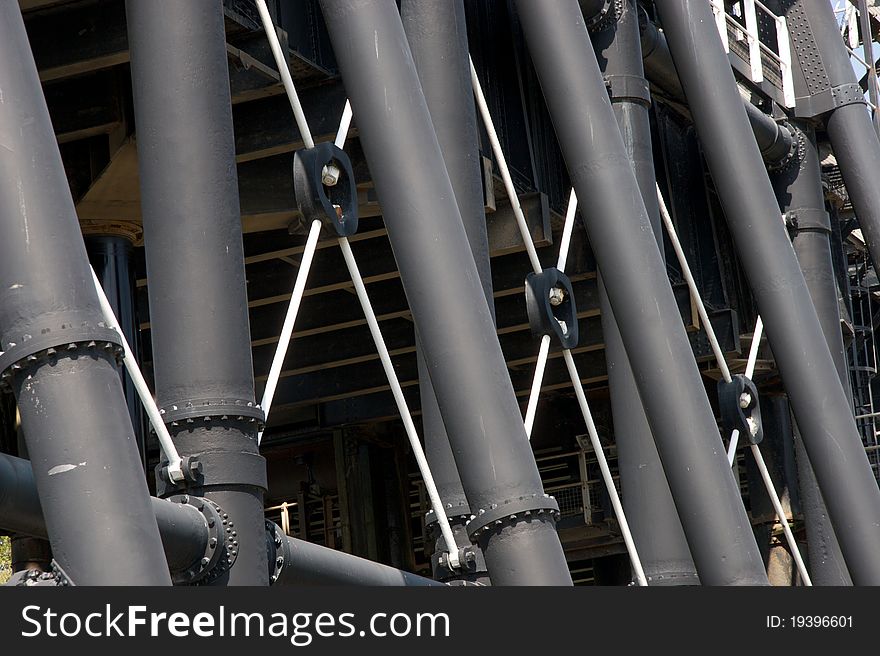 Steel Legs supporting a large industrial structure. Architecture from victorian era