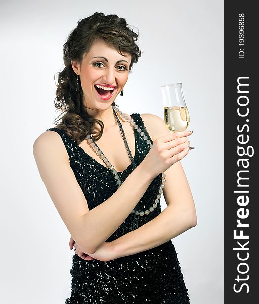 Smiling brunette with a glass of wine