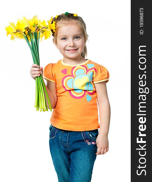 Beautiful little girl with a bouquet of daffodils. Beautiful little girl with a bouquet of daffodils