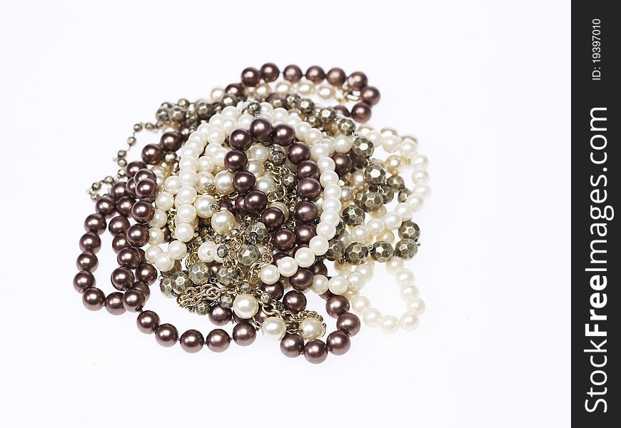 Heap of different necklaces on white background. Heap of different necklaces on white background