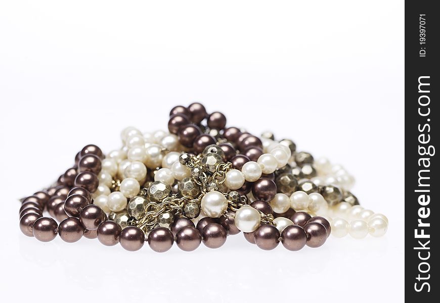 Heap of different necklaces on white background. Heap of different necklaces on white background
