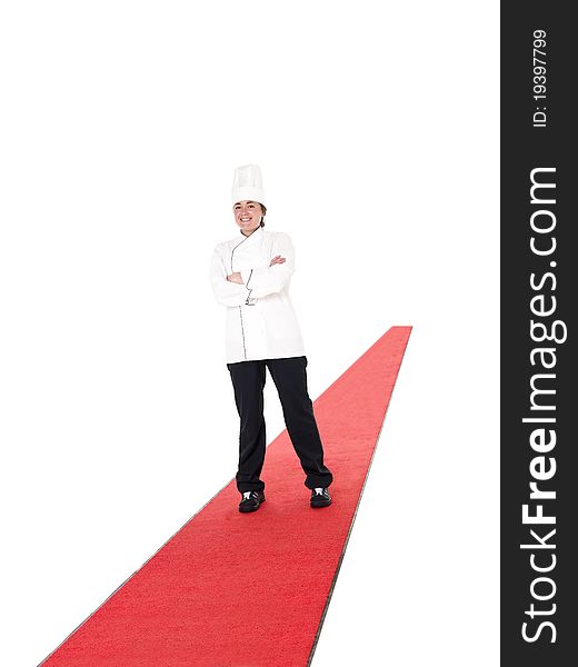 Chef standing on a red carpet isolted on white background. Chef standing on a red carpet isolted on white background