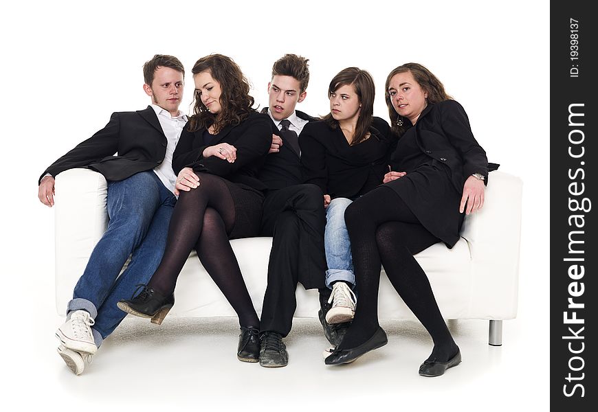 Group of people in a sofa isolated on white background