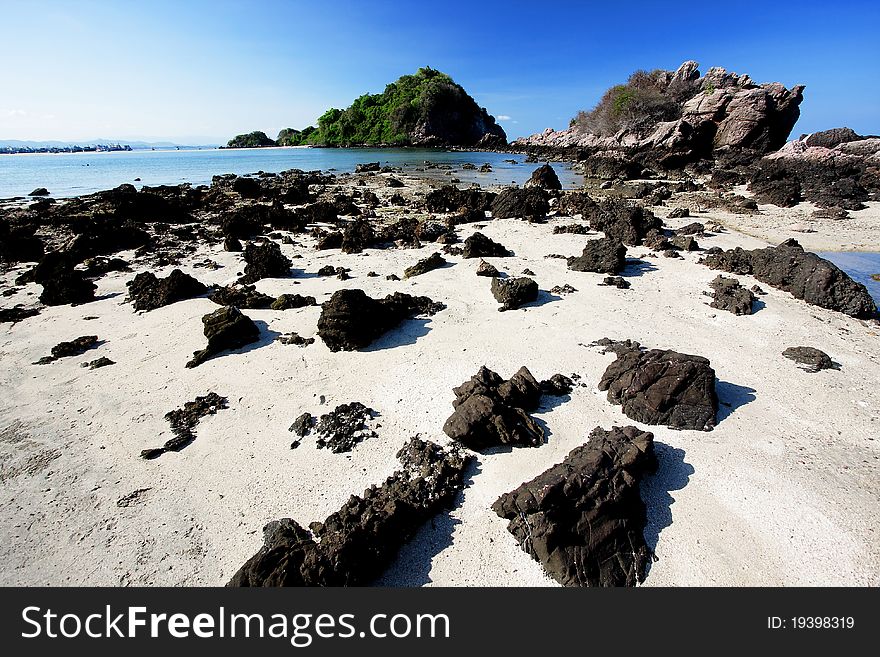 Nice Beach In Southern Thailand With Stones And Sand Foreground. Nice Beach In Southern Thailand With Stones And Sand Foreground