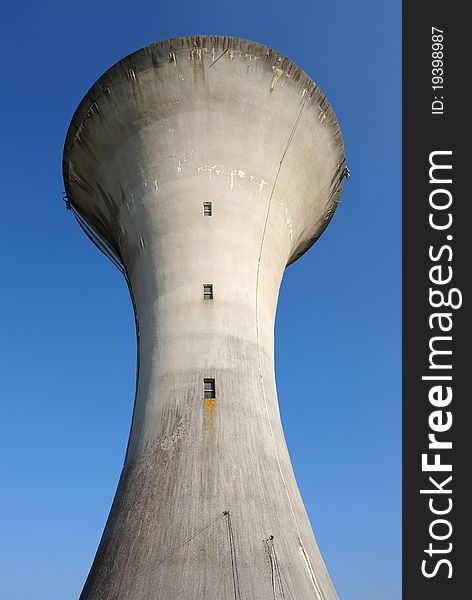 An old water tower in concrete. An old water tower in concrete