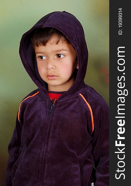 A innocent kid who thinking deeply & is lost in his dreamy world. he is giving a good pose to the camera man. A innocent kid who thinking deeply & is lost in his dreamy world. he is giving a good pose to the camera man.