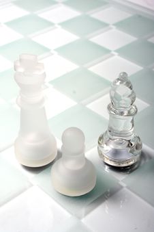 Glass Chess Pieces Stock Photo