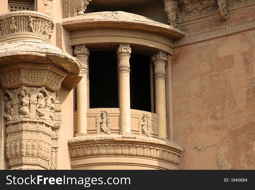 Mystery balcony at the royal braon's palace located in Cairo's heliopolis district. The palace is now closed and the balcony is empty and dark.