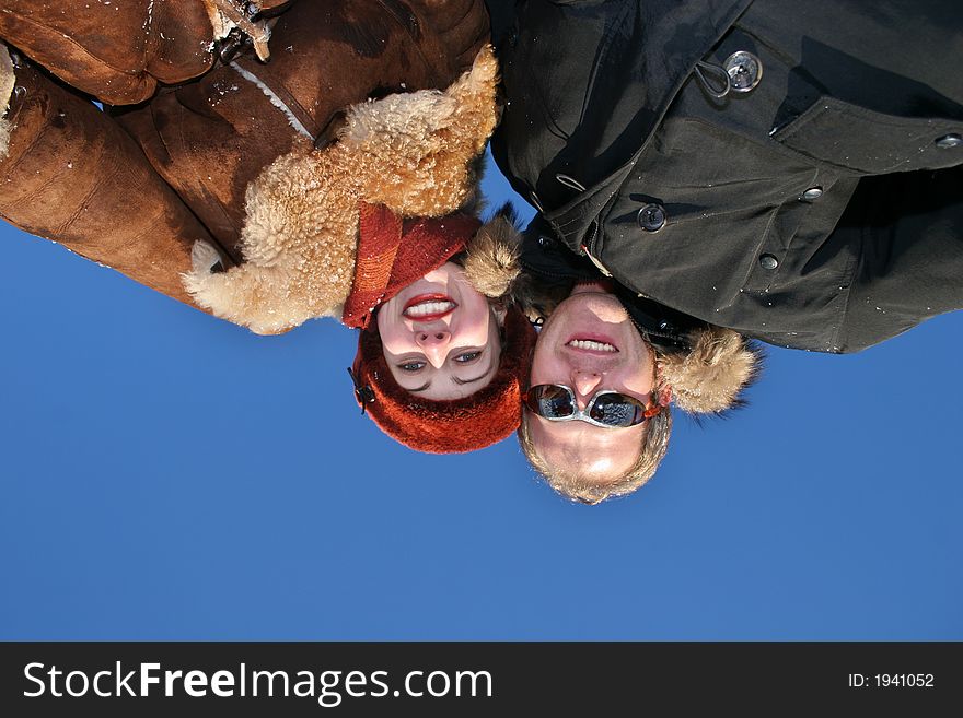 Winter couple on sky