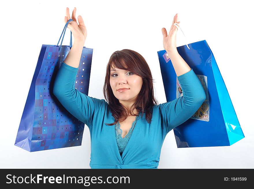 Attractive woman with shopping bags on white background. Attractive woman with shopping bags on white background