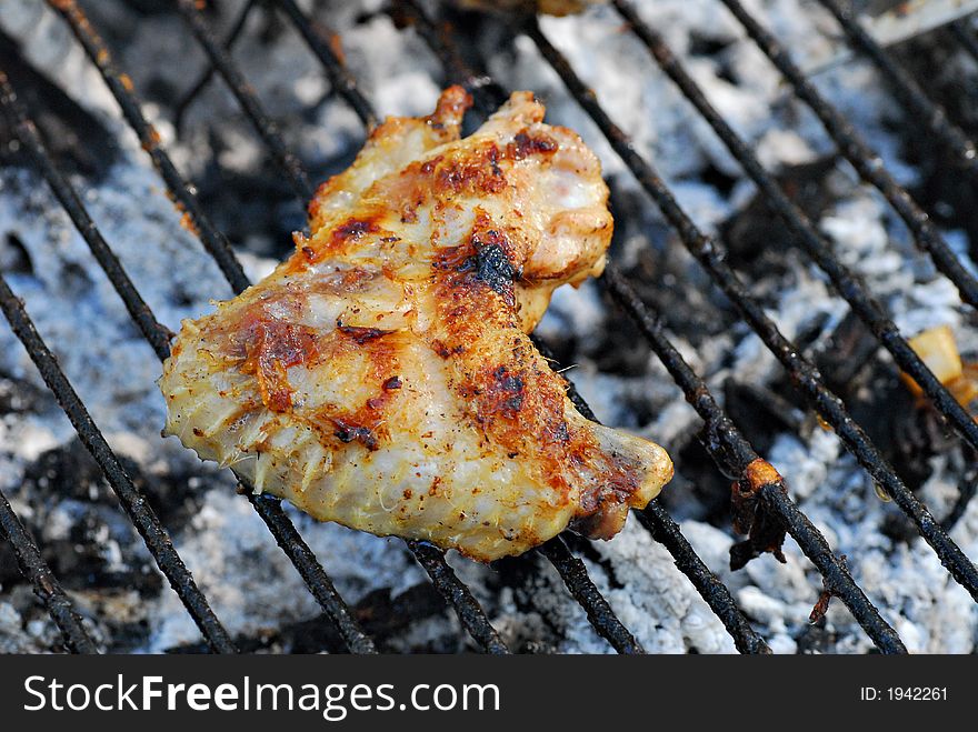 Chicken wing on barbecu grill. Chicken wing on barbecu grill