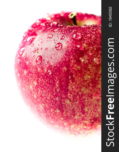 Isolated red apple with waterdrops