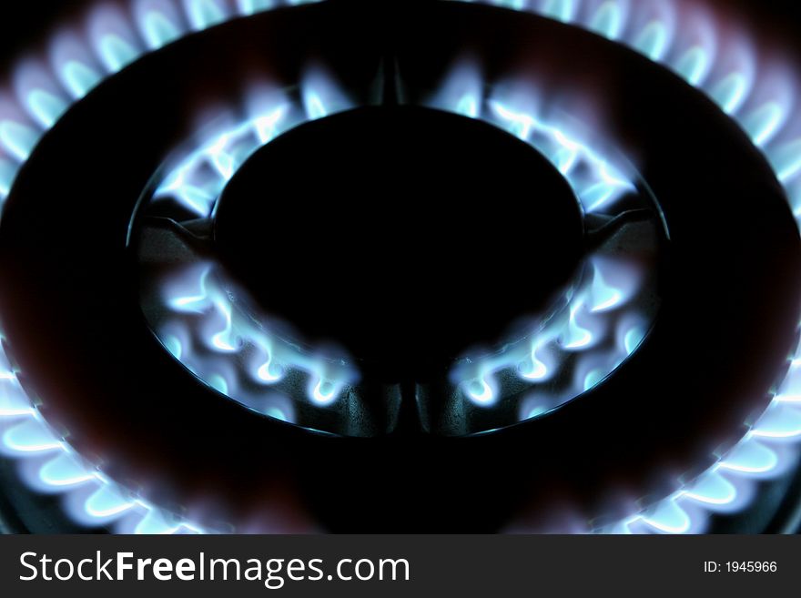 Round stove burner over black
