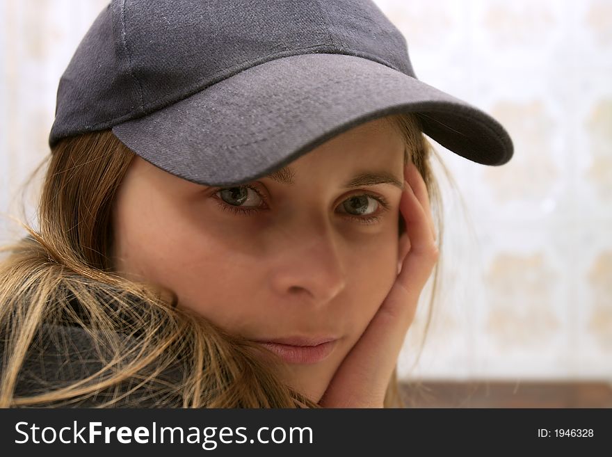 Girl with hat close-up portrait