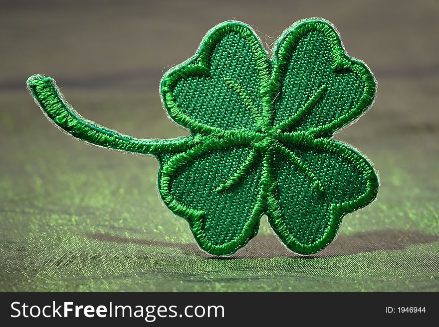 Four leaf green clover-skilful manual silk embroidery. Four leaf green clover-skilful manual silk embroidery