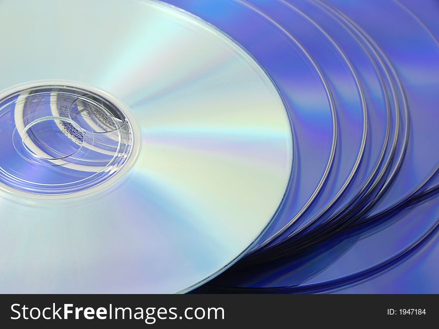A pile of blue CD's in closeup