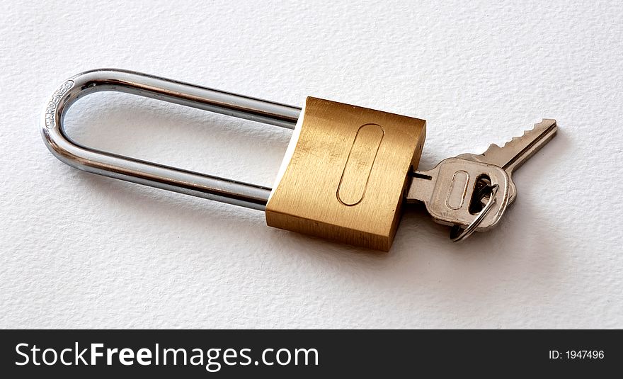 A padlock close with keys
