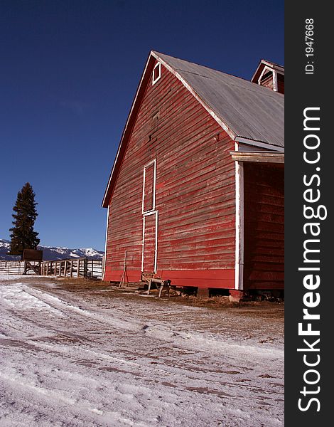 Rustic red Idaho barn in early winter. Rustic red Idaho barn in early winter