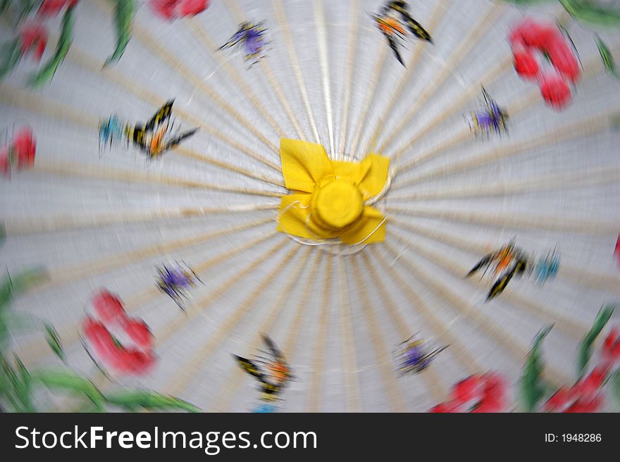 Colorful chinese umbrella in motion