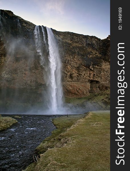 The Seljalandsfoss Fall in the morning. The Seljalandsfoss Fall in the morning