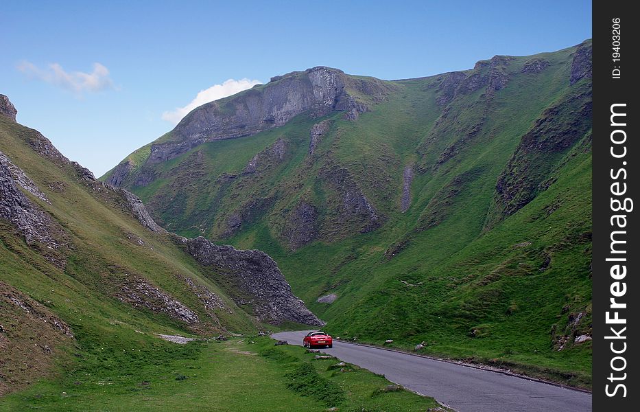 Winnats Pass Derbyshire showing cars on the down hill section