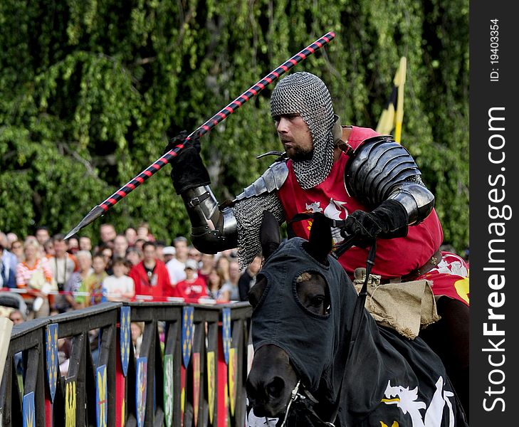 Medieval knight on horseback in a tournament.