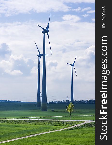Spring landscape with wind turbine towers. Spring landscape with wind turbine towers.