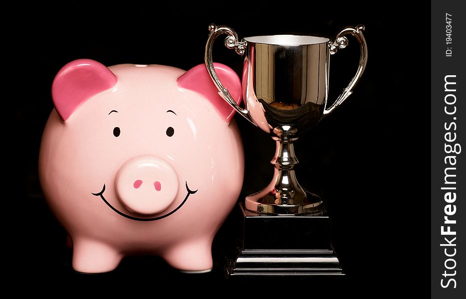 Piggybank with trophy