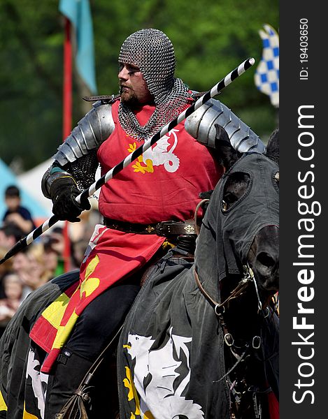 Medieval knight on horseback in a tournament.