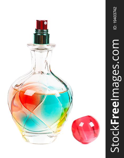 Colorful perfume bottle over white background