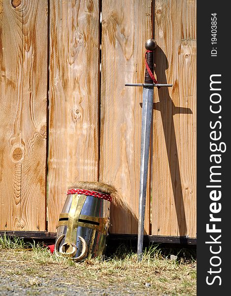 Knight's helmet and sword knight tournament. Knight's helmet and sword knight tournament