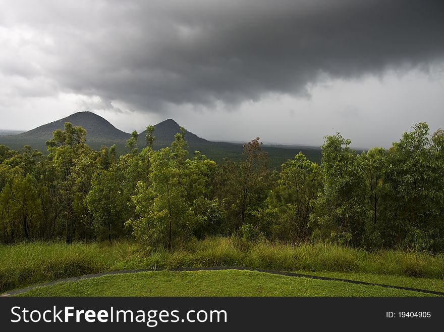 Scenes of nature: Rain front passing in the wilderness of Australia's Glass house mountains hinterland. Scenes of nature: Rain front passing in the wilderness of Australia's Glass house mountains hinterland